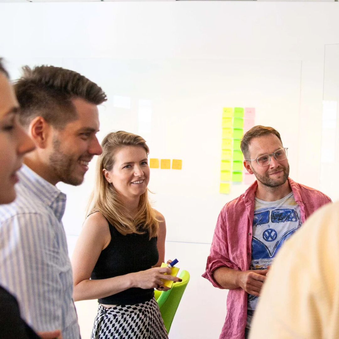 Smiling team of project consultants in an office 