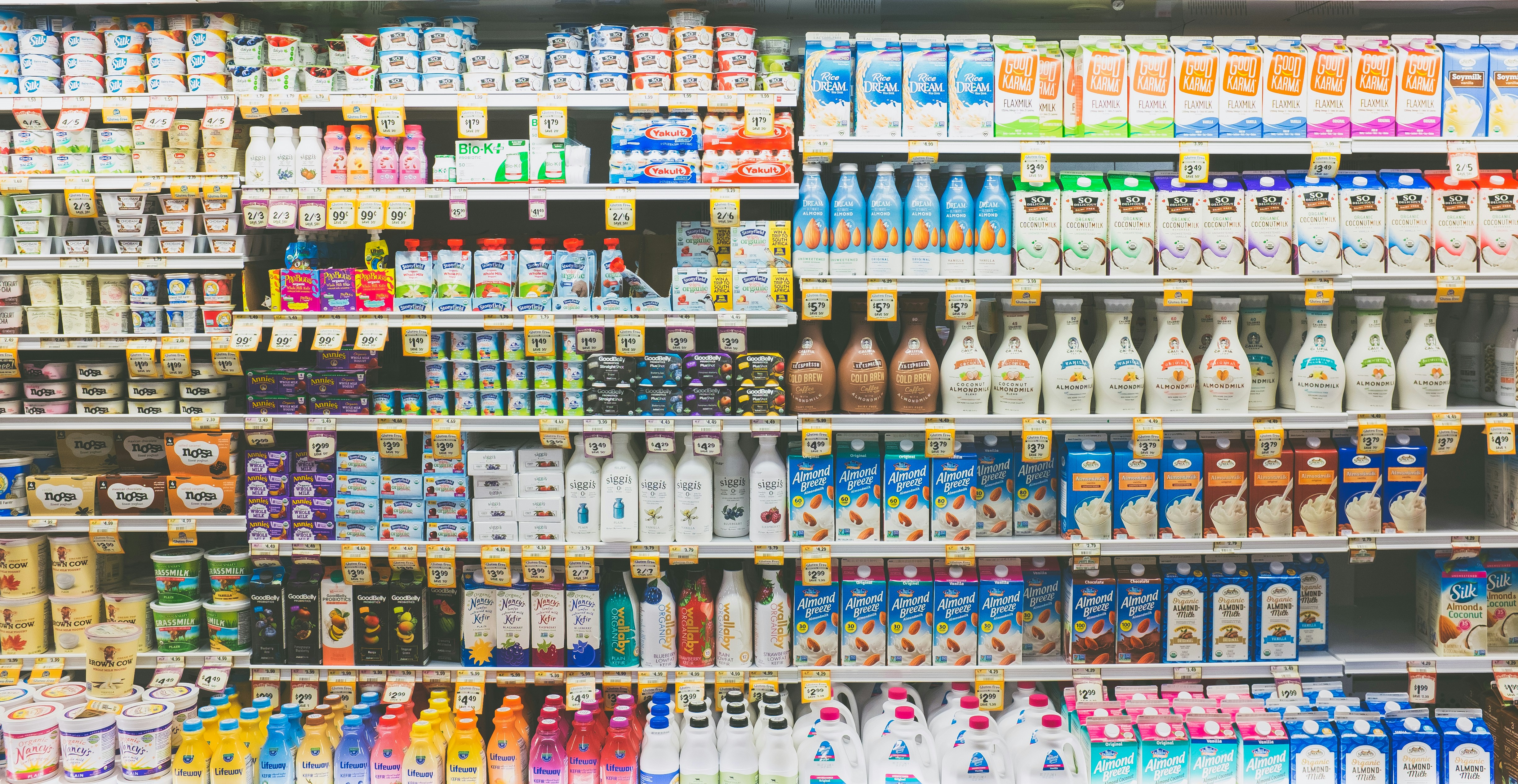 Dairy products in a supermarket fridge.