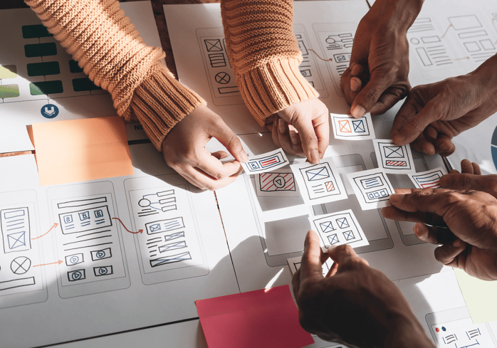 Designers working on wireframes.