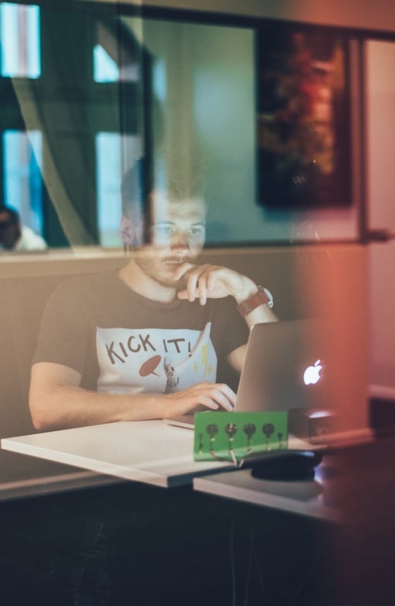 man working with a laptop