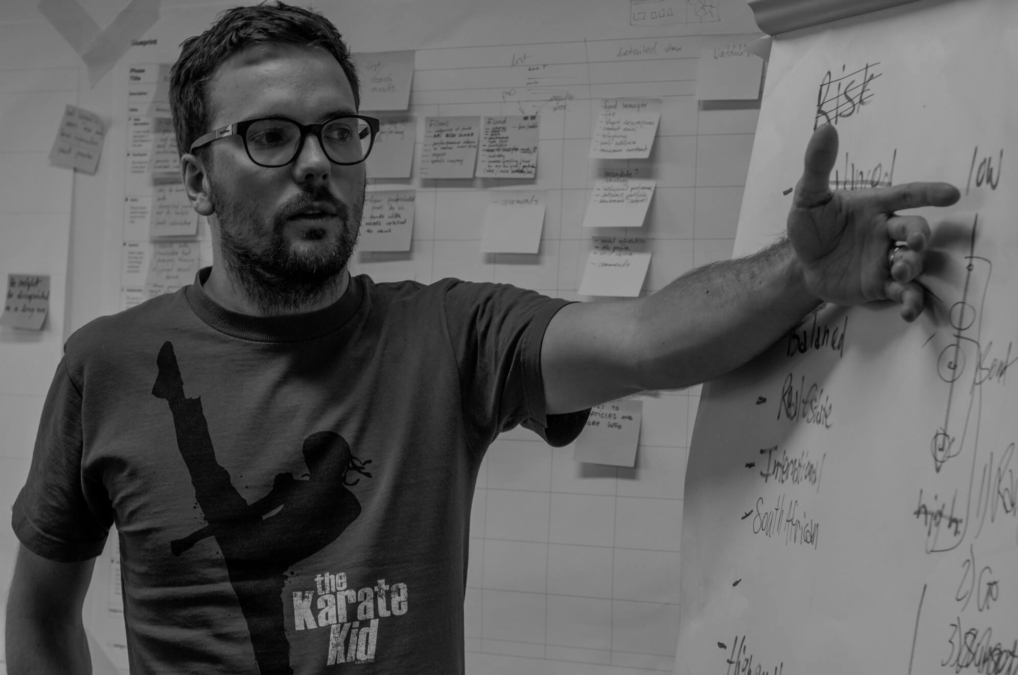 Man pointing to a board during a PDS