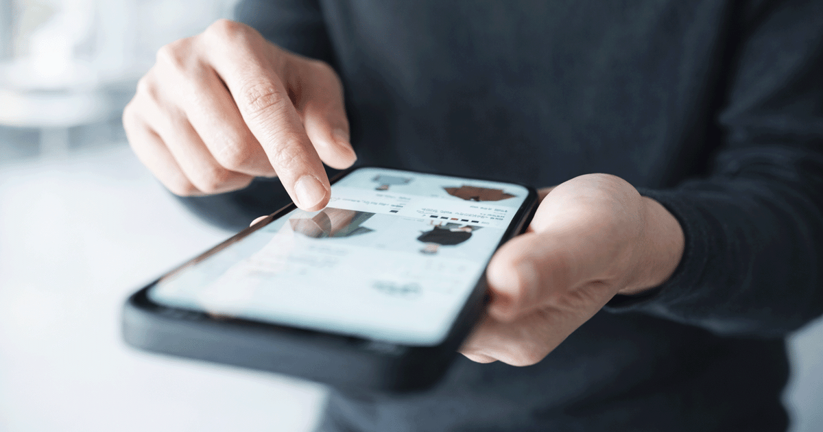 A person doing shopping on a mobile phone.