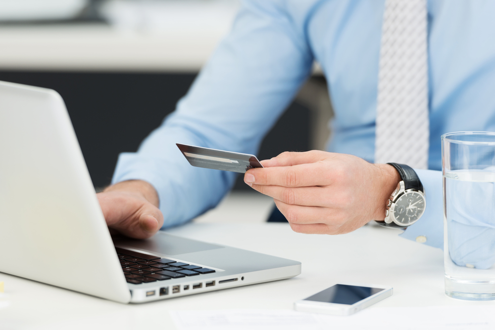 Man paying with credit card