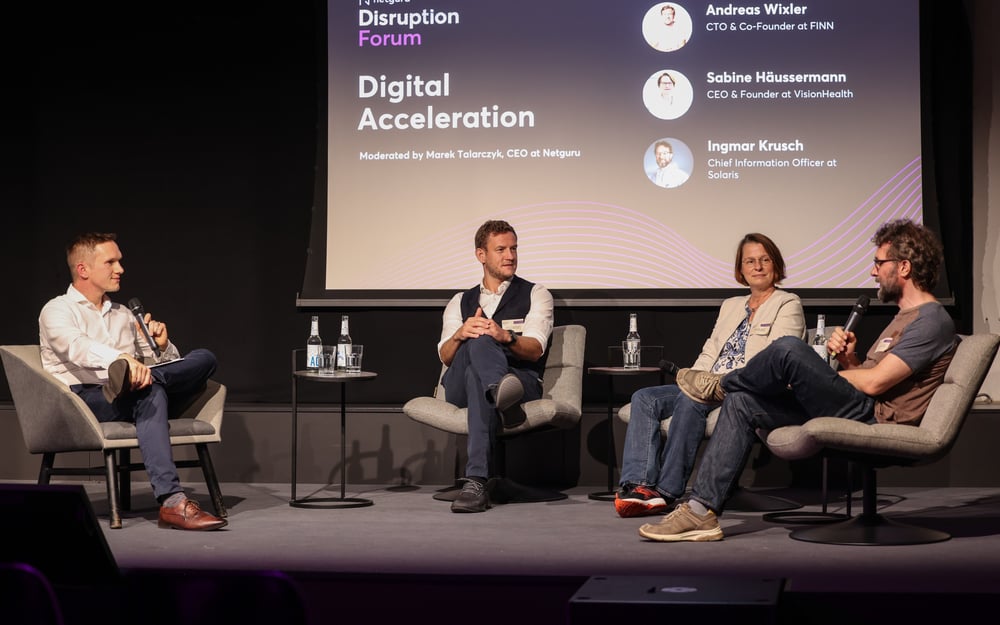 panelists talking at an event