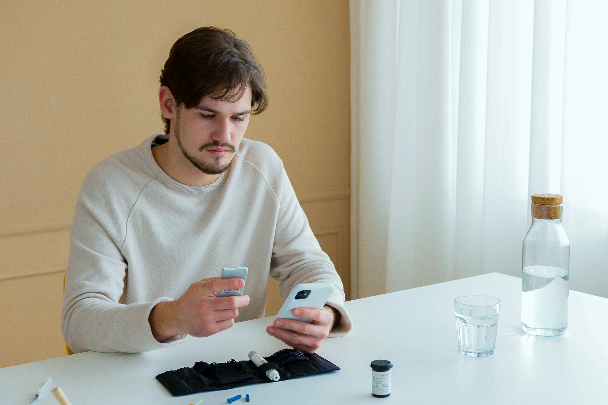 Man with a glucose monitoring device.